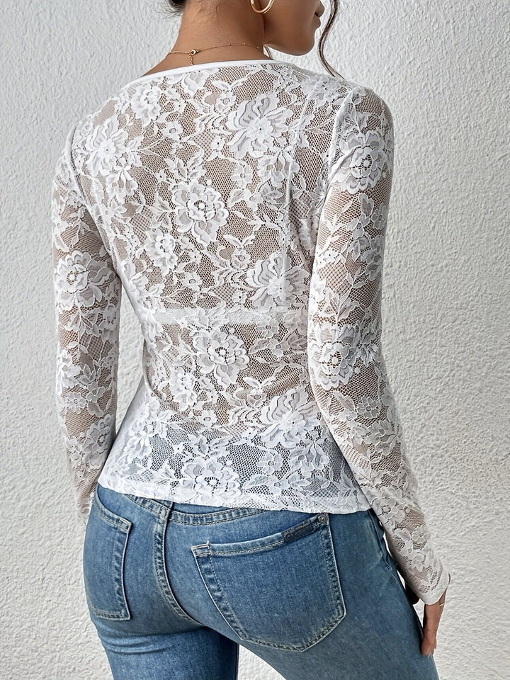 Top de manga larga con encaje floral