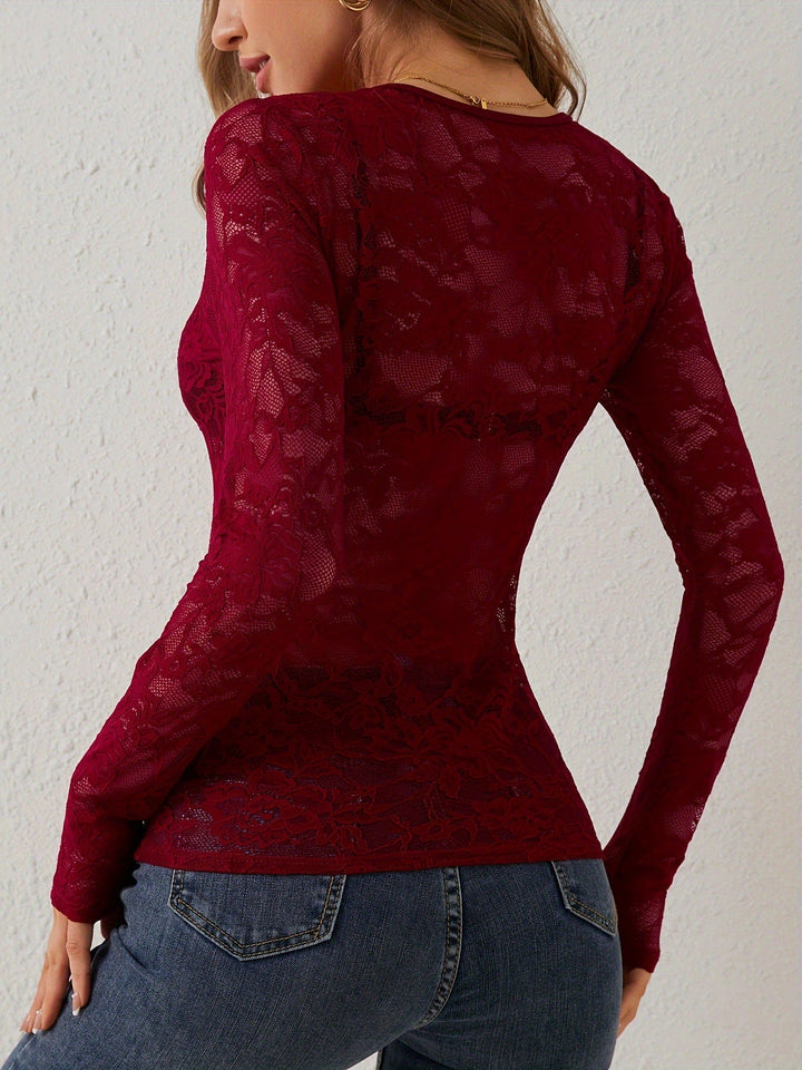 Top de manga larga con encaje floral